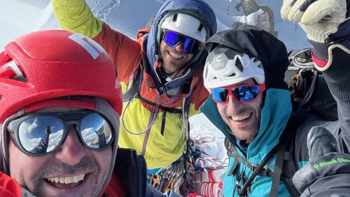 Marc Tpralles, Bru Busom, and Ruben Sanmartin on the summit of Yerupaja. Photo: Marc Toralles
